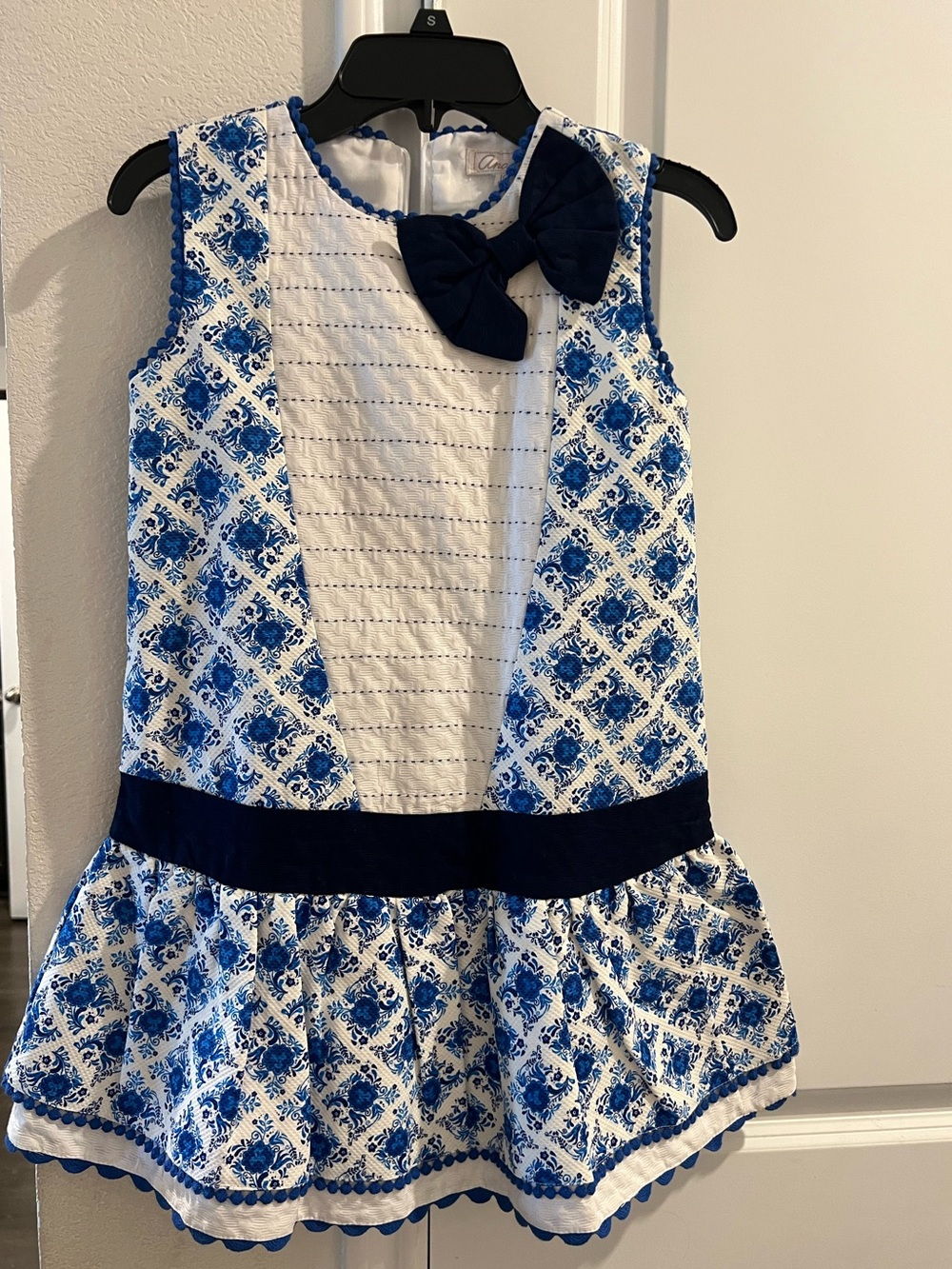 Navy & White Floral Girls' Sleeveless Dress with Bow Accent